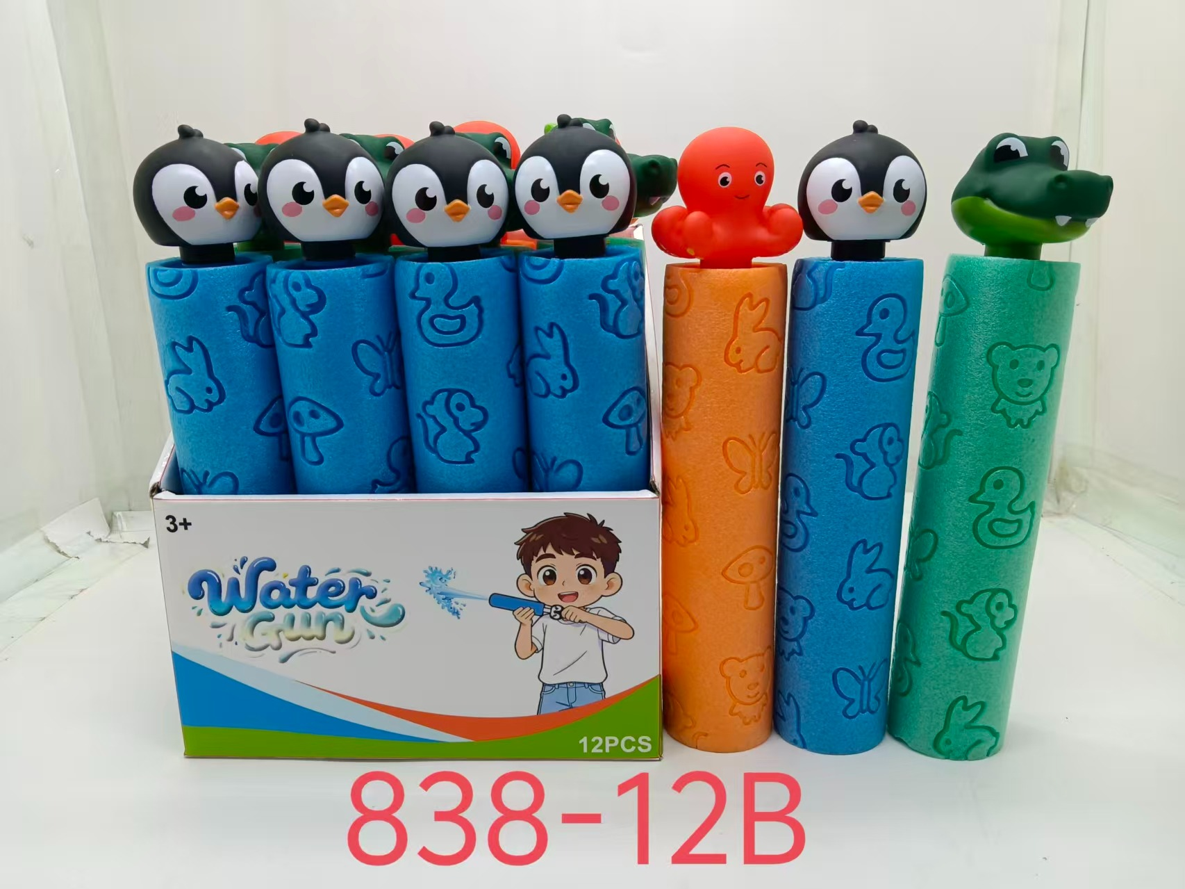 TL83392 Cartoon Penguin Octopus Crocodile Foam pull-out Water gun EVA embossed sponge handle Children's summer swimming pool beach Water fight and water play toy Application Scenario