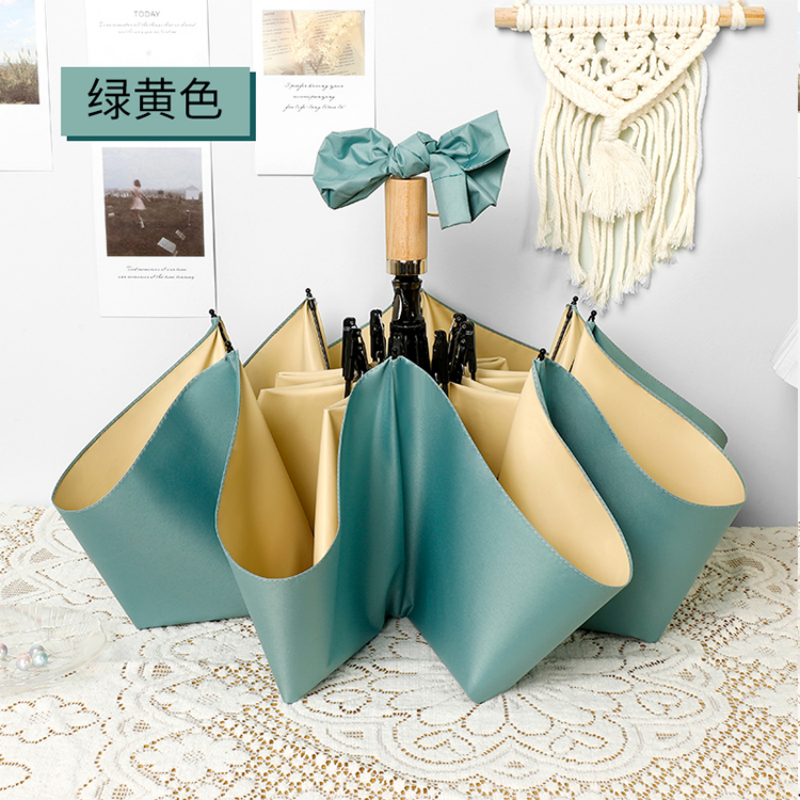 Hengdun double-layer color glue three-fold sunshade umbrella, women's wooden handle, all-weather and all-weather, macaron solid color splicing sun umbrella, UPF50 + UV protection, portable and compact, commuting gentle atmosphere sun umbrella Application Scenario