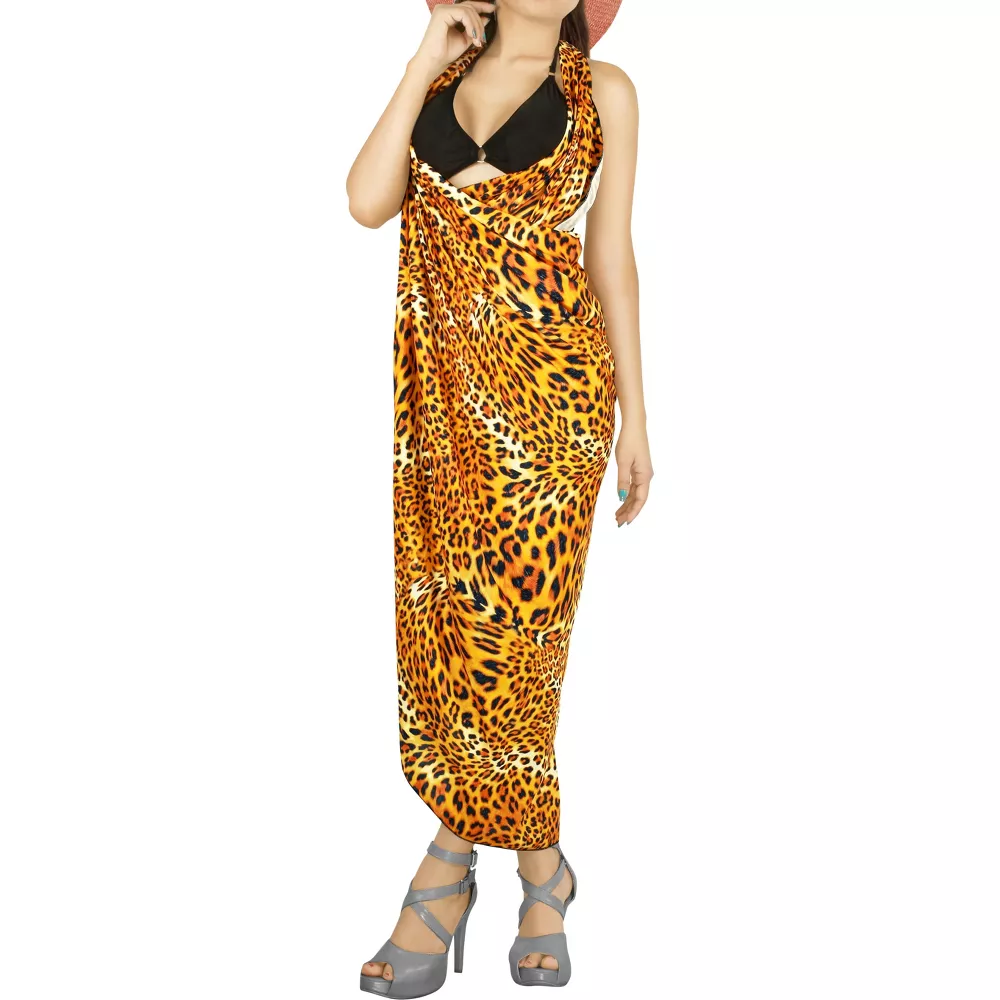In South America, a piece of skirt made of cotton fabric canga towel Sarong Pareo skirt. Custom pattern Qni shawl style Specification image
