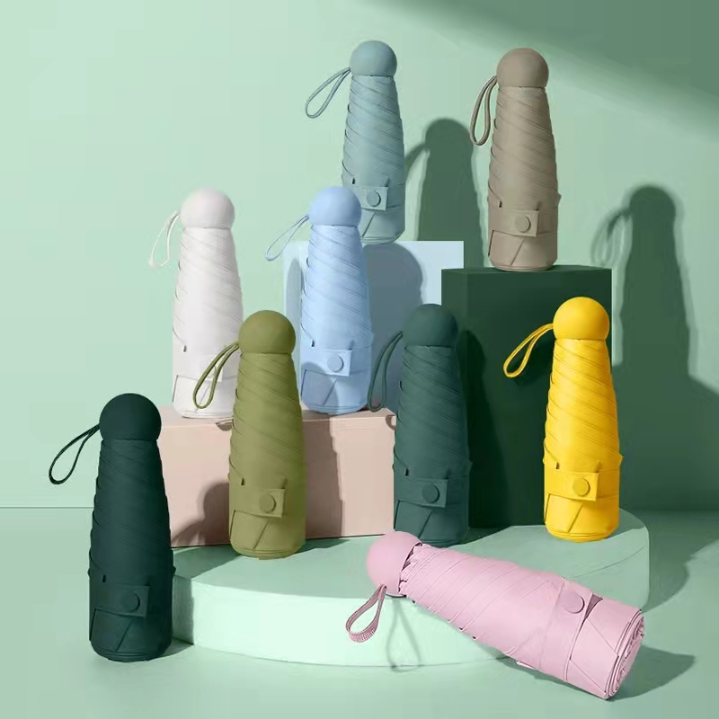 Hengdun Mini Capsule 50% folding Sun Umbrella for Women, compact and portable pocket umbrella, black rubber, super strong sun protection and UV protection, all-weather and all-weather folding sun umbrella for students, ultra-light small umbrella for commuting, available in multiple colors