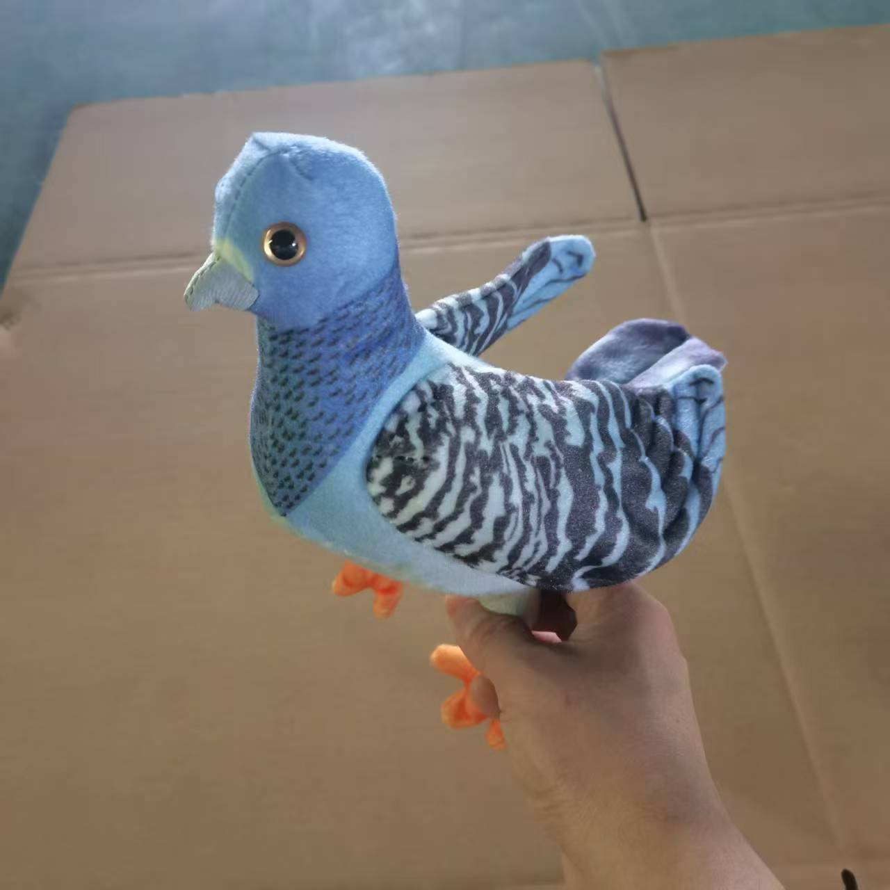 Blue and grey plush toy of the Nebo Magpie Specification image
