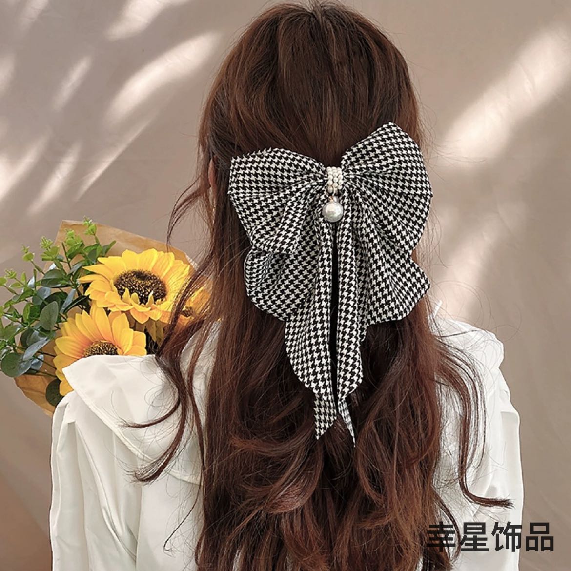 Xingxing Accessories French large bow hair clip, a trendy and fashionable style, with a spring clip on the top of the back of the head Item Picture