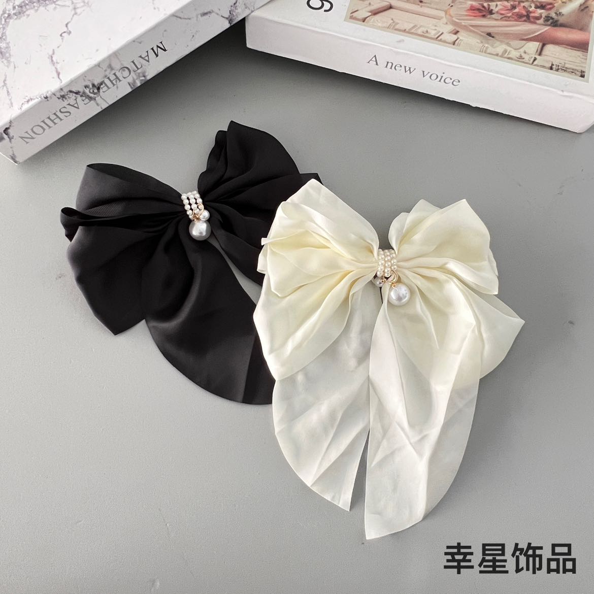 Xingxing Accessories French large bow hair clip, a trendy and fashionable style, with a spring clip on the top of the back of the head Specification image