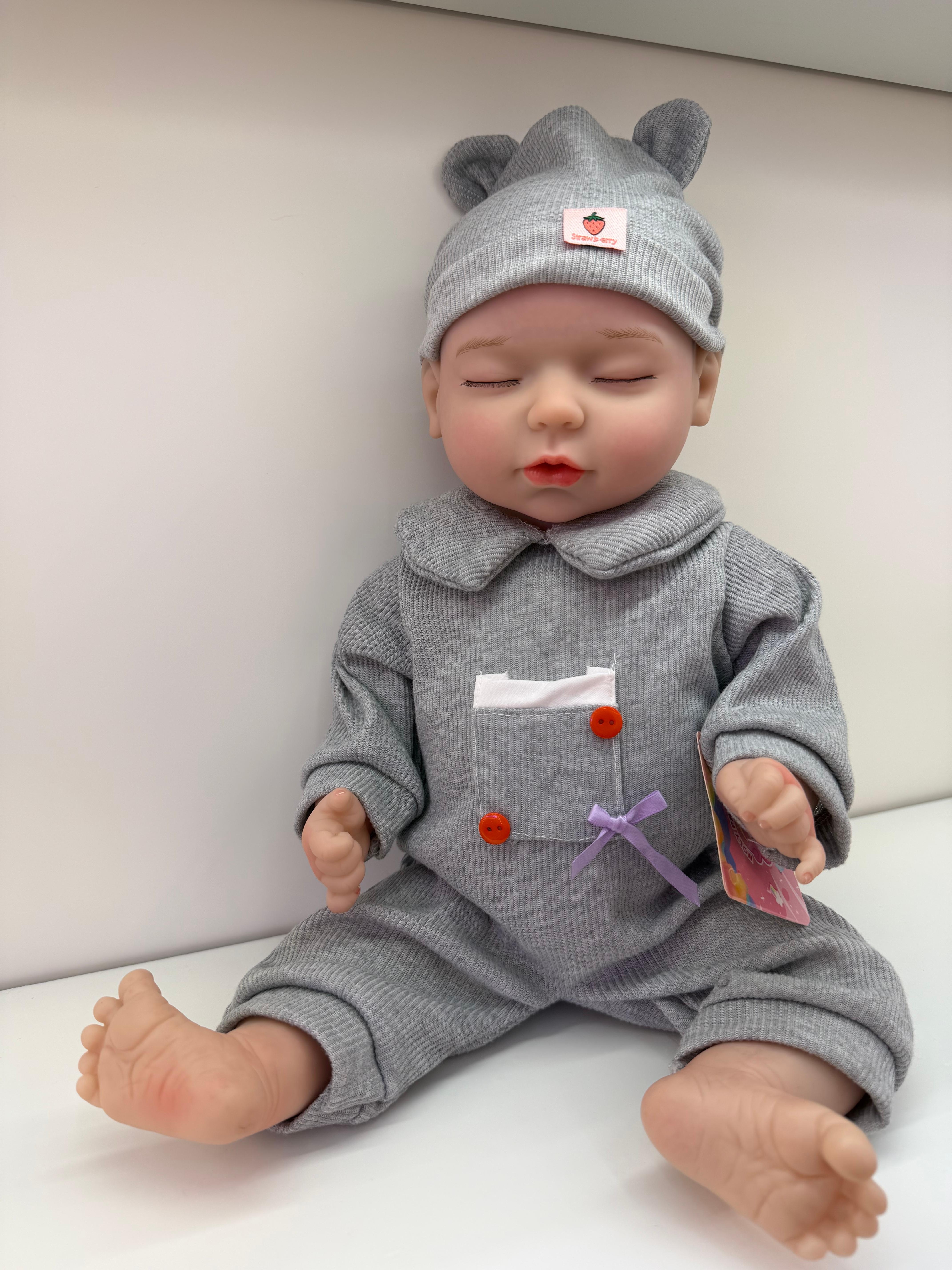 Muñeca linda bebé de silicona con sensor llorará y reirá mano de obra detallada y realista Specification image