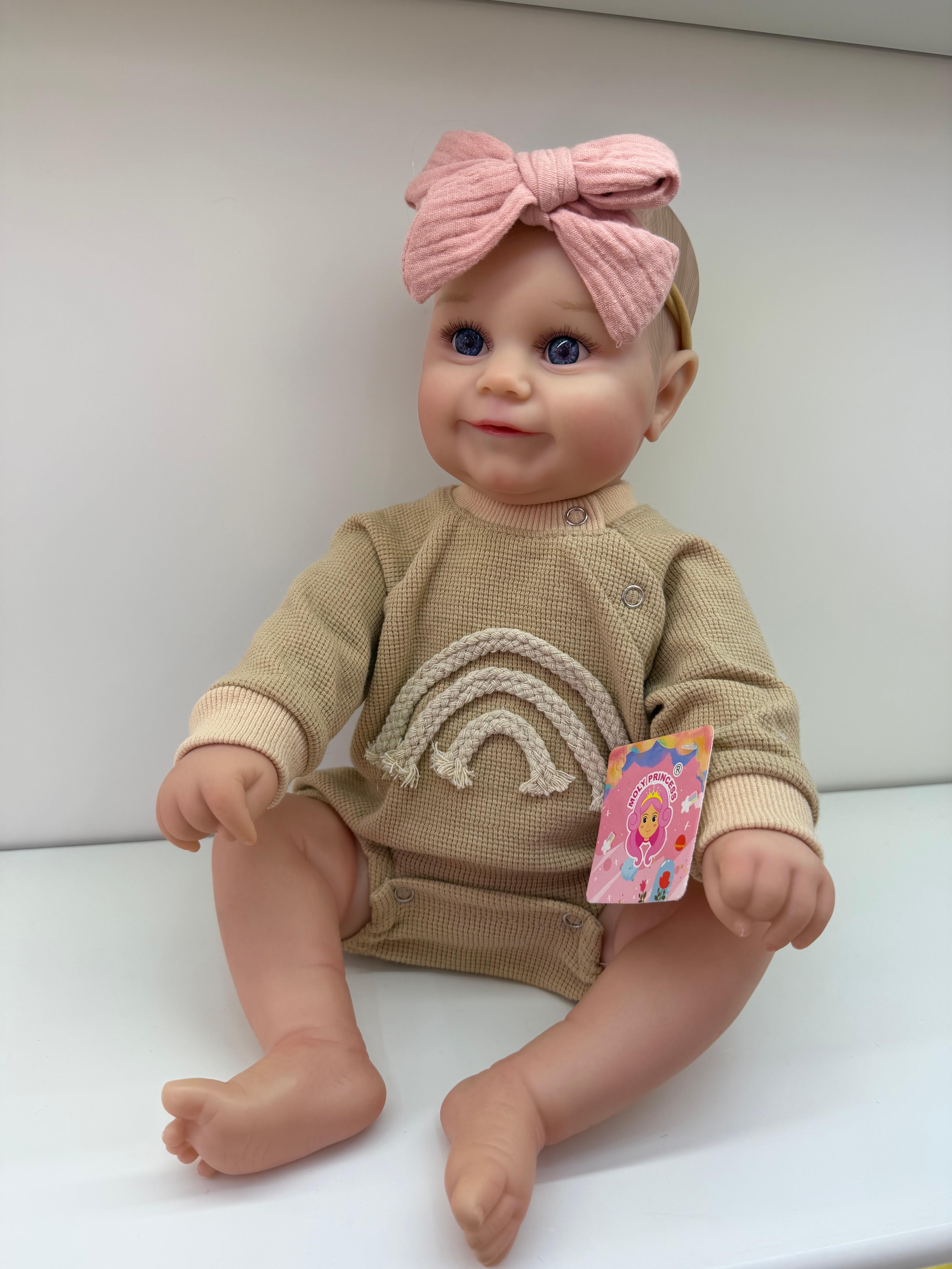 Silicone baby dolls are cute. There are various types of baby clothes with sensors full image