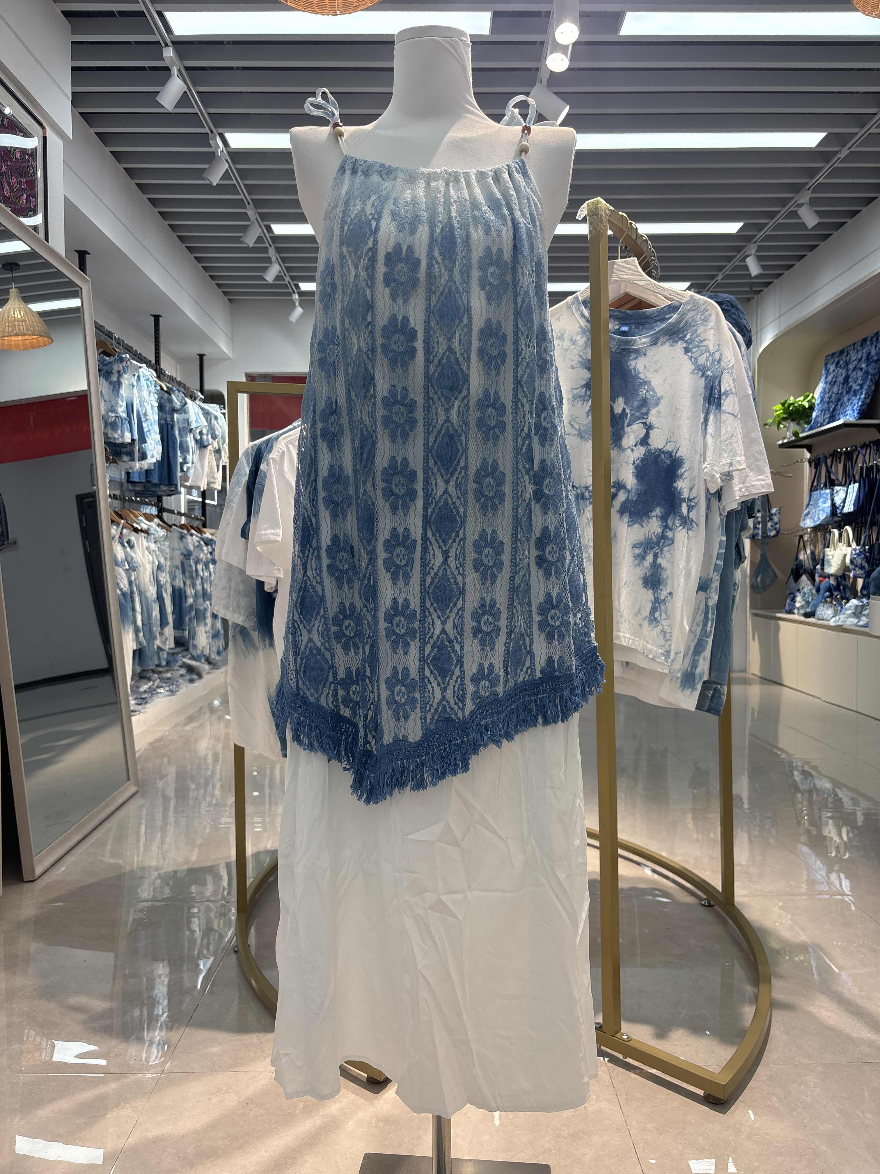 French lace backless halter dress, a long white lace halter dress with a blue and white pattern design, elegant and fashionable