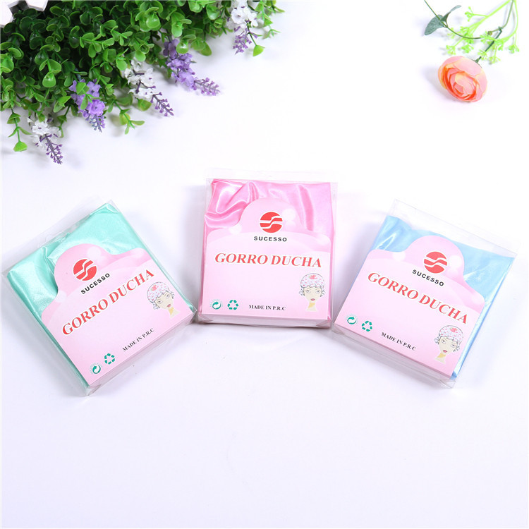 义乌好货 厂家直销热卖 大号色丁布单色浴帽 环保色丁材质 洗澡必备的浴帽-1006/35800白底实物图