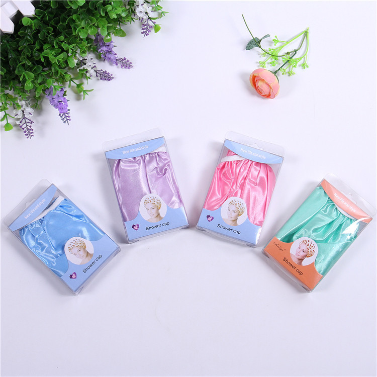 义乌好货 厂家直销热卖 色丁布单色盒装浴帽 材质舒适 简单大方 洗澡必备-1006/35800白底实物图