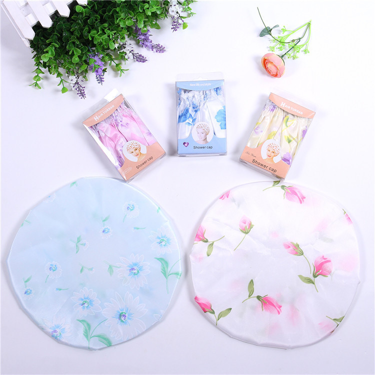 义乌好货 厂家直销热卖 色丁布花边浴帽盒装 家居必备洗澡用品 舒适护发套-1006/35800白底实物图