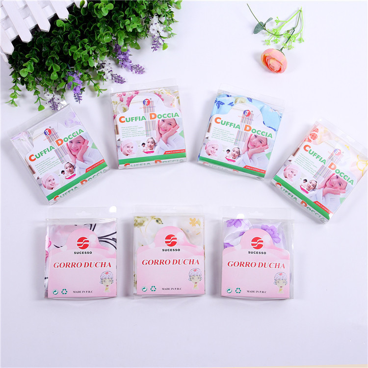 义乌好货 厂家直销热卖 大号色丁布花布浴帽 混款混色 洗澡必备的浴帽-1006/35800白底实物图