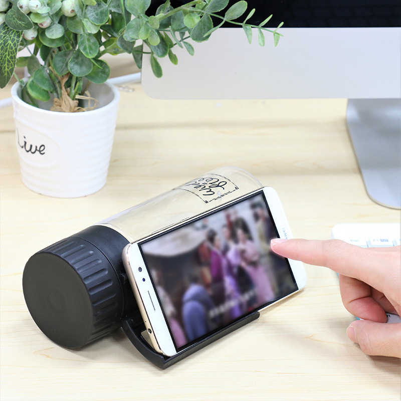 Yiwu Good Goods Di Yi New Creative Transparent Plastic Cup Adult Environmental Protection Portable Drop Resistant Mobile Phone Stand Straight Drink Space Water Cup -1006/36591 Application Scenario
