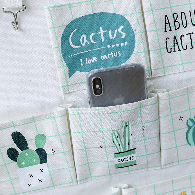 Yiwu Selection 7 pocket hook cactus wall hanging bag multi-functional sundry folding hanging bag Application Scenario