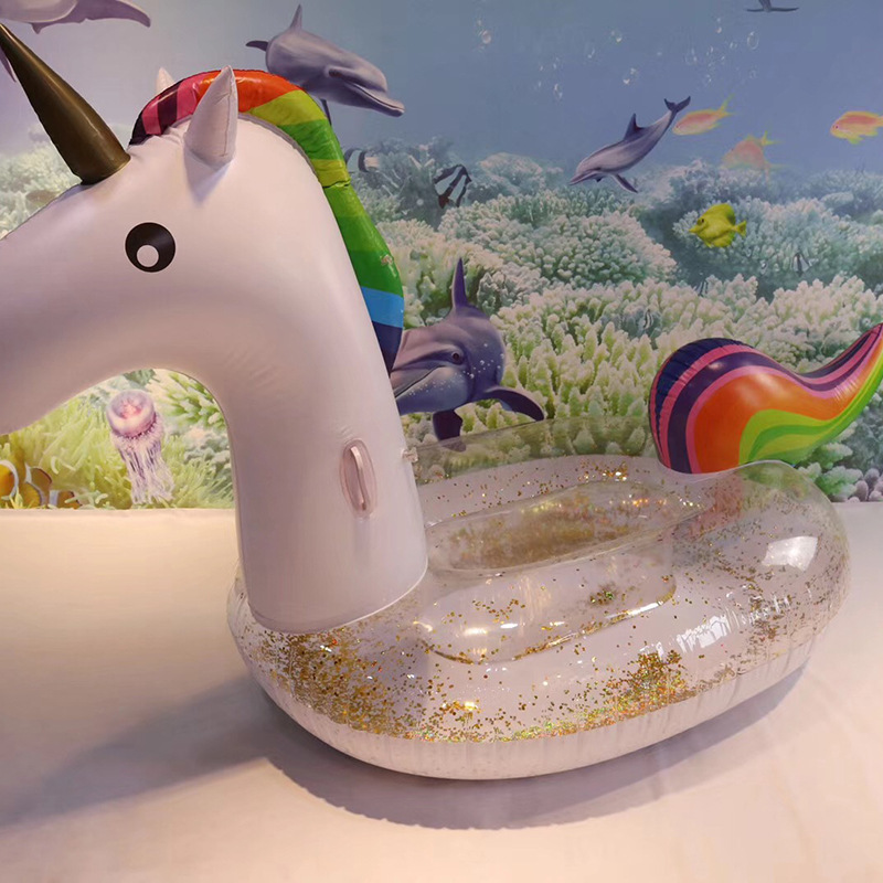 Yiwu's best-selling creative cartoon PVC inflatable colorful unicorn transparent tape gold onion pink water floating float swimming ring -1001/1215