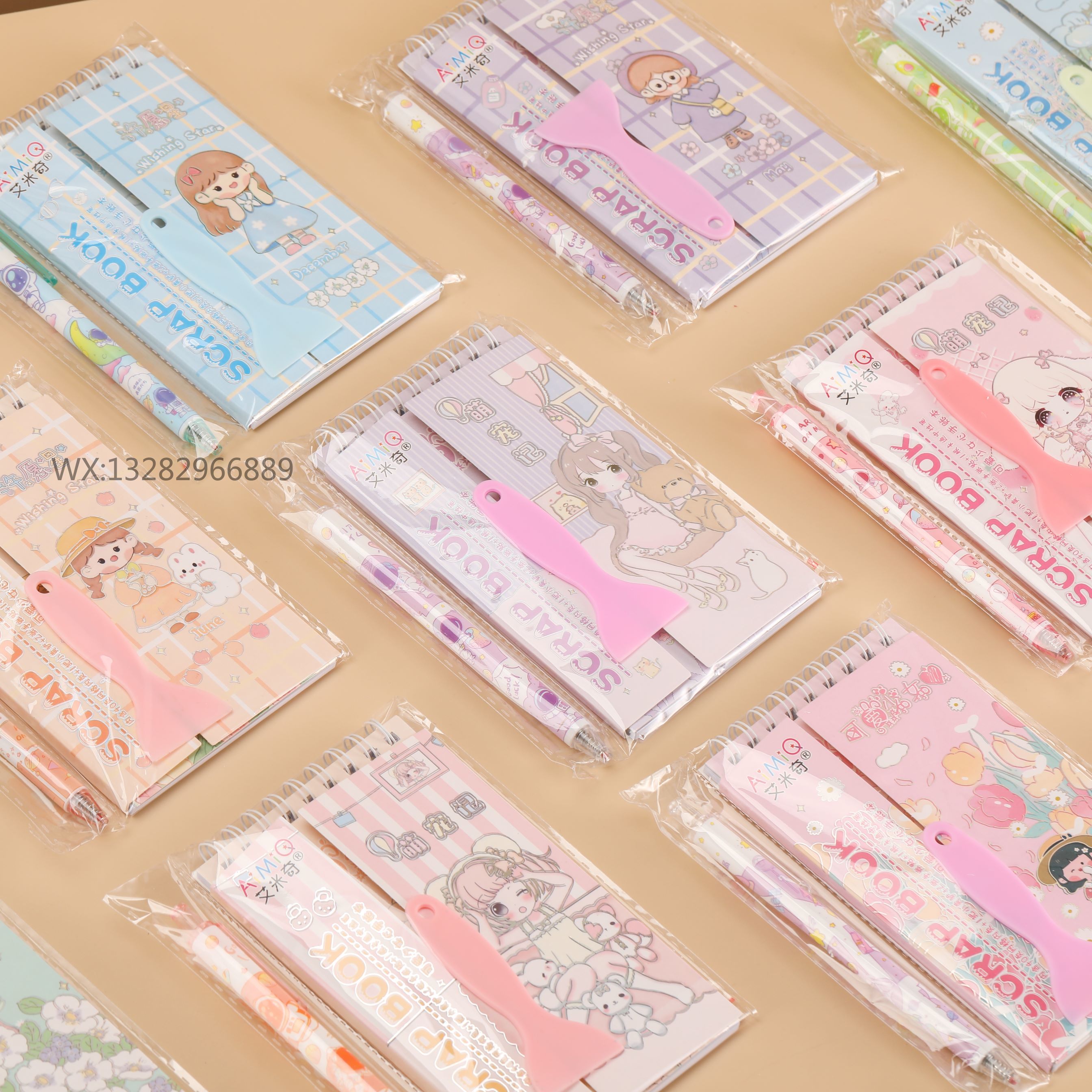 A multi-functional and cute girl's hand-held notebook, including a coil book, a material book, a release book, and a three-in-one hand-held notebook set