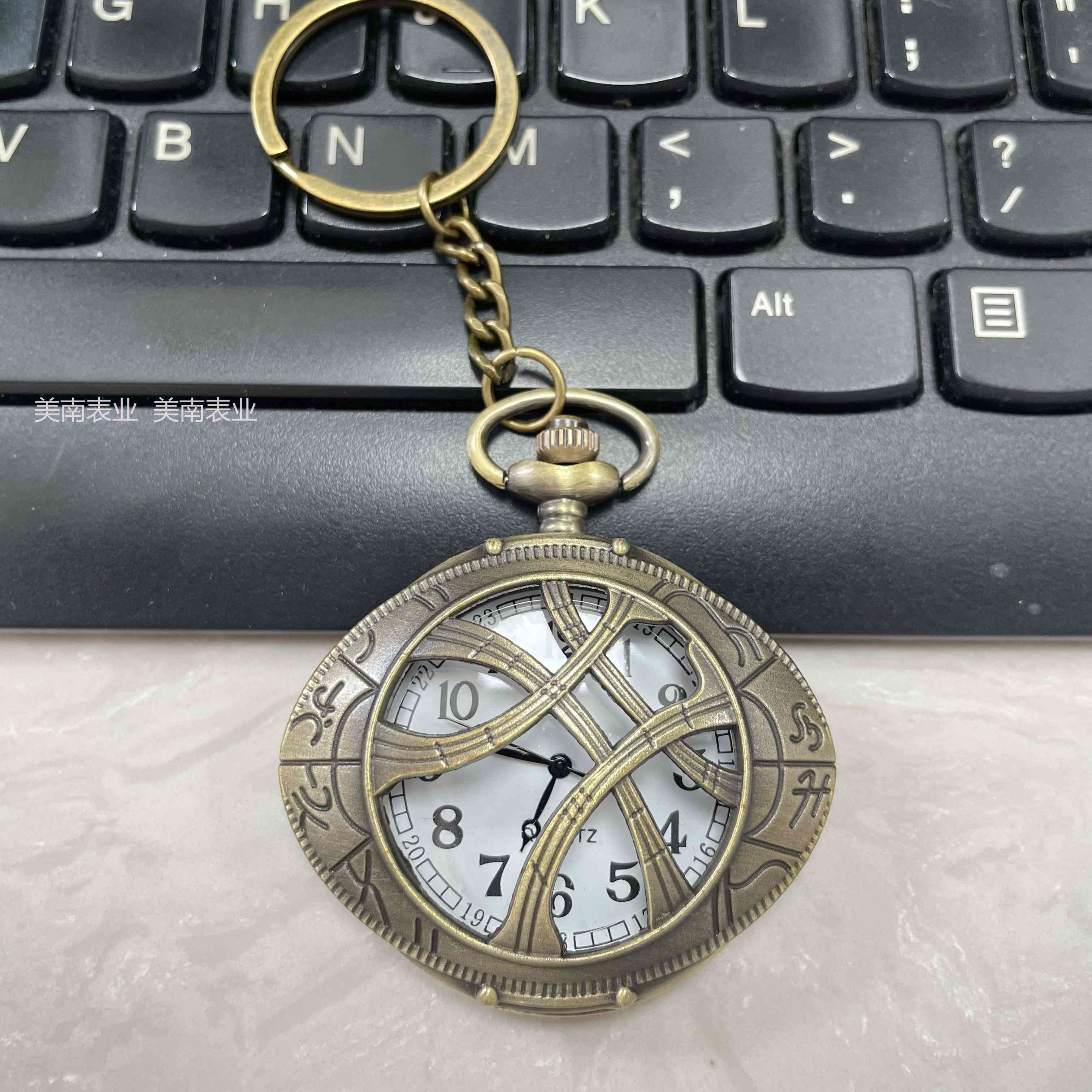 New Angel Magic Eye pocket watch, creative retro flip keychain watch, travel commemorative watch factory direct sales details Picture