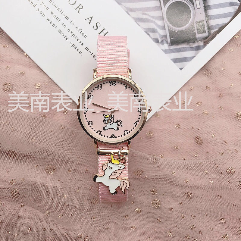 The new fairy student watch features a simple canvas strap with a pendant, a creative and trendy quartz watch with a nylon strap and a Kawaii watch Application Scenario