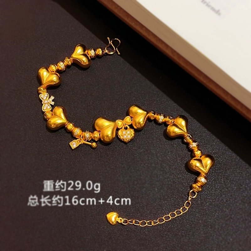 This is a delicate heart-shaped bow bracelet with a full circle of heart shapes, the same style of sand gold from Athena Jewelry and Gold store detail image 3