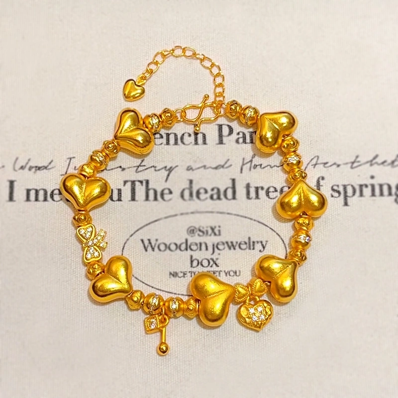 This is a delicate heart-shaped bow bracelet with a full circle of heart shapes, the same style of sand gold from Athena Jewelry and Gold store Specification image