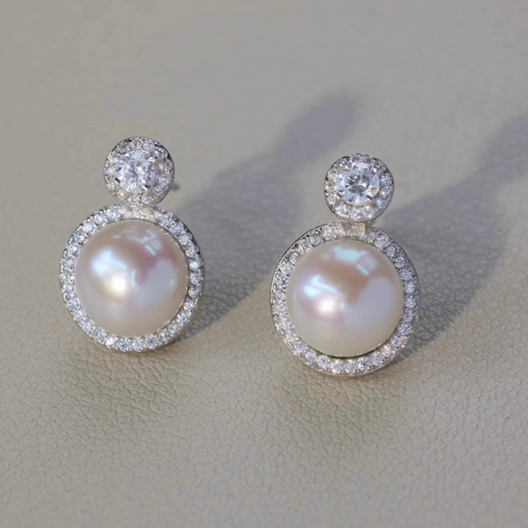 Pigeon egg niche design sense natural strong light 5A freshwater pearl stud earrings S925 silver needle niche light luxury earrings Specification image
